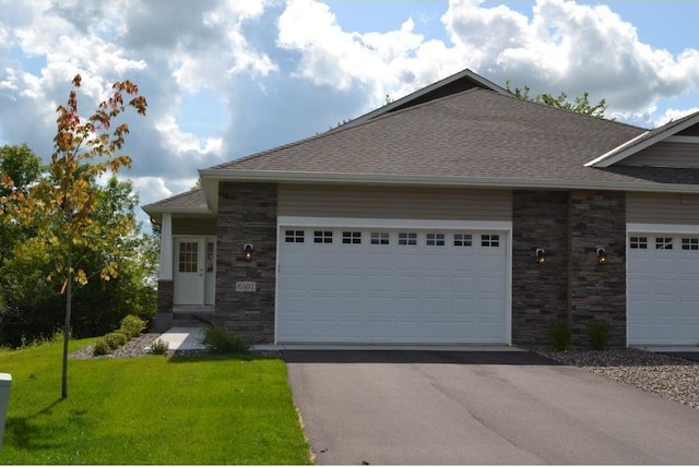 8071 Winfield Rd, Rockford, MN 55373 - single story home with a front yard, stone siding, driveway, and an attached garage