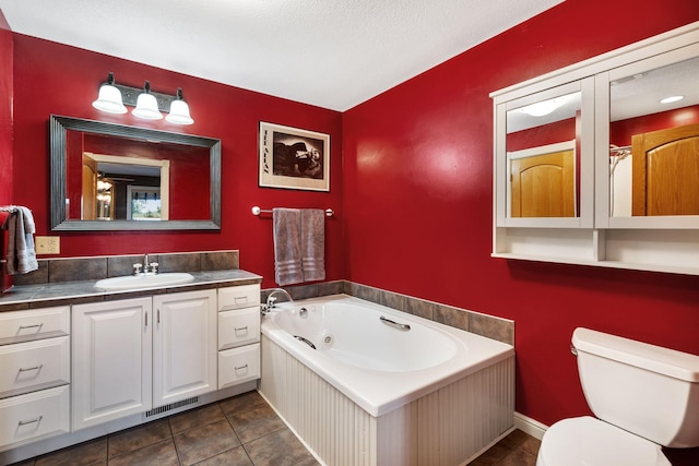 bathroom featuring a whirlpool tub, toilet, visible vents, tile patterned floors, and vanity