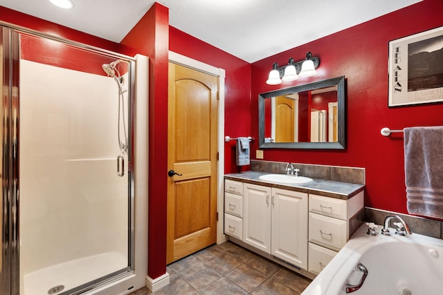 bathroom featuring a stall shower, a whirlpool tub, and tile patterned floors