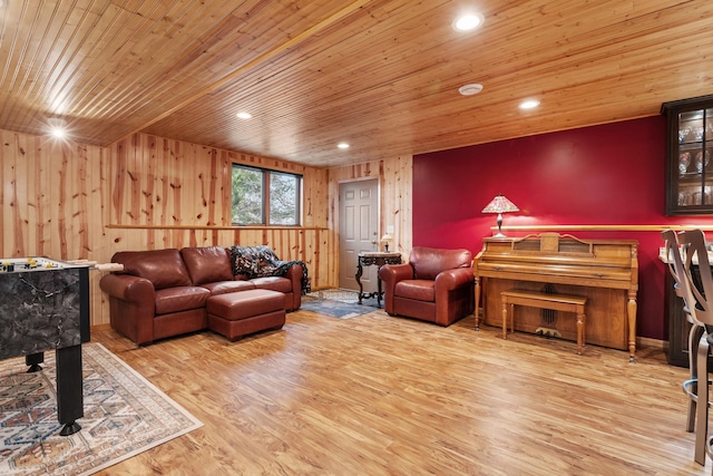 living room featuring recessed lighting, wooden ceiling, and wood finished floors