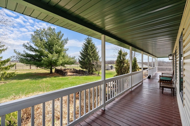 deck featuring a yard