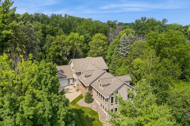 aerial view featuring a forest view
