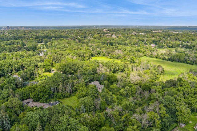 aerial view with a wooded view