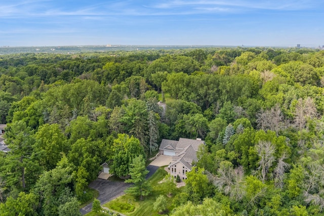 bird's eye view with a view of trees