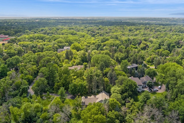 aerial view featuring a forest view