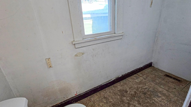 spare room with visible vents