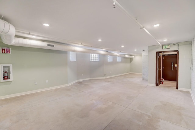 basement featuring recessed lighting, visible vents, and baseboards