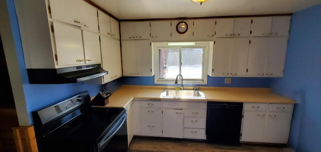 kitchen featuring dishwasher, range with electric stovetop, a sink, and white cabinetry