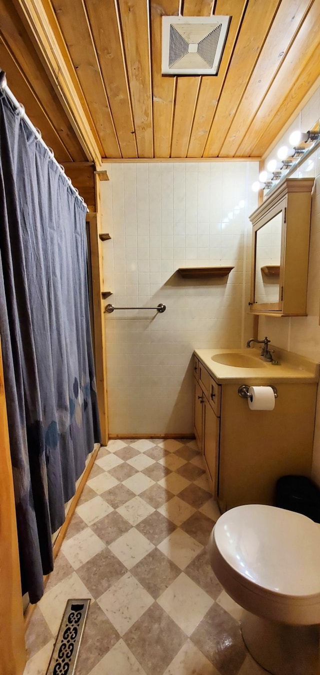 bathroom with visible vents, wood ceiling, tile patterned floors, curtained shower, and vanity