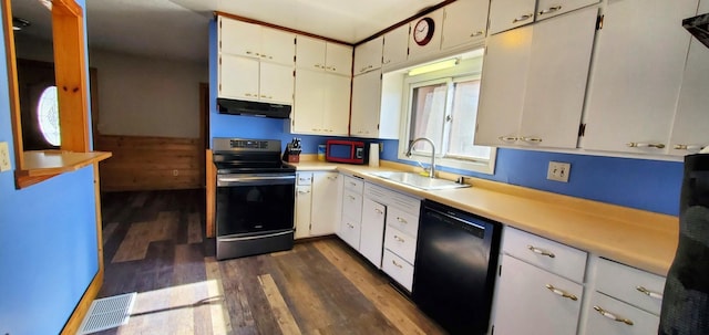 kitchen featuring under cabinet range hood, a sink, visible vents, black dishwasher, and electric stove