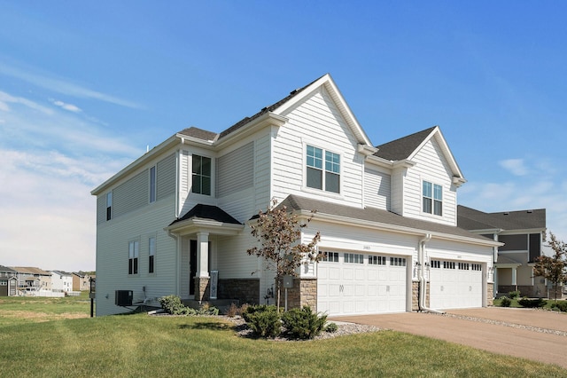 3485 109th Ln NE, Blaine, MN 55449 - view of front of property with a garage, cooling unit, stone siding, a front yard, and concrete driveway