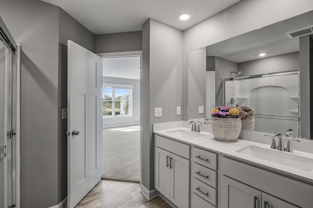 3485 109th Ln NE, Blaine, MN 55449 - full bath with double vanity and a shower