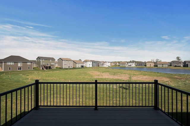3485 109th Ln NE, Blaine, MN 55449 - wooden deck featuring a residential view, a water view, and a lawn