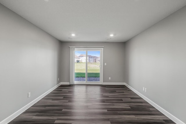 3485 109th Ln NE, Blaine, MN 55449 - spare room with recessed lighting, baseboards, and dark wood-style floors