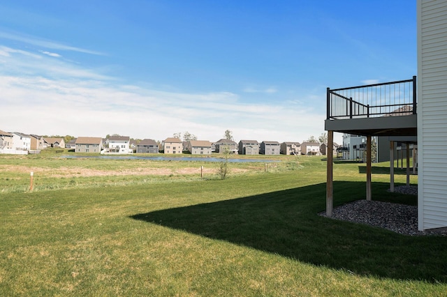 3485 109th Ln NE, Blaine, MN 55449 - view of green lawn with a residential view and a wooden deck