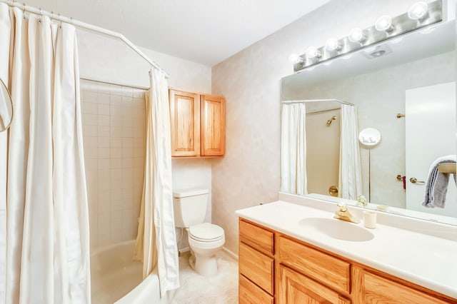 bathroom featuring toilet, shower / tub combo with curtain, and vanity