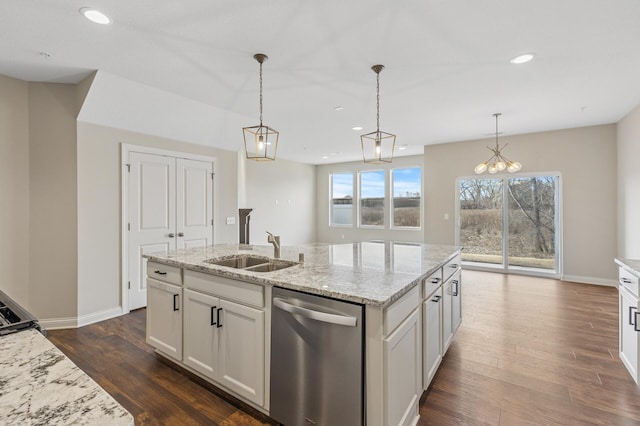 kitchen with white cabinets, dark wood-style flooring, stainless steel dishwasher, a sink, and recessed lighting