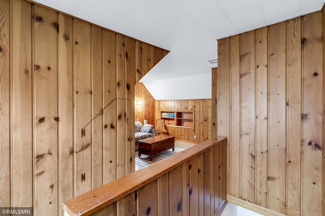 interior space featuring wooden walls