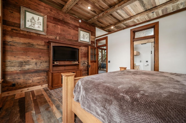 bedroom featuring wood walls, wood ceiling, dark wood finished floors, and beam ceiling