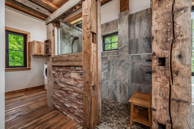 full bath with a walk in shower and hardwood / wood-style floors