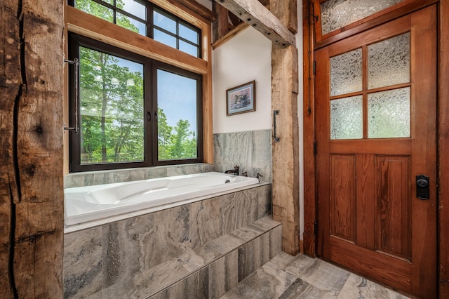 full bathroom featuring a garden tub