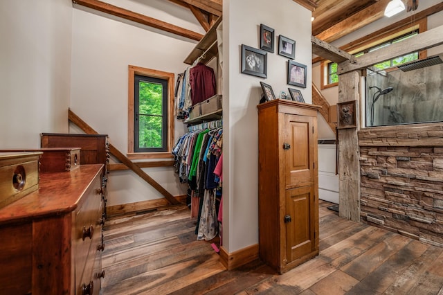 interior space with hardwood / wood-style floors, stairway, and baseboards