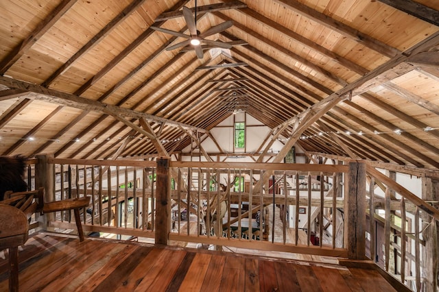 miscellaneous room with vaulted ceiling with beams, wood ceiling, hardwood / wood-style floors, and an upstairs landing