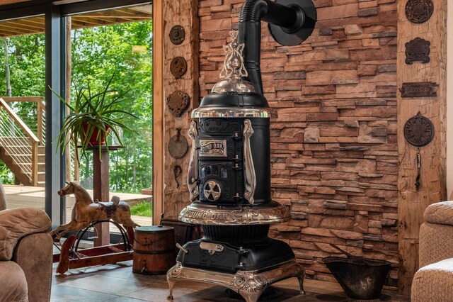 interior details featuring a wood stove