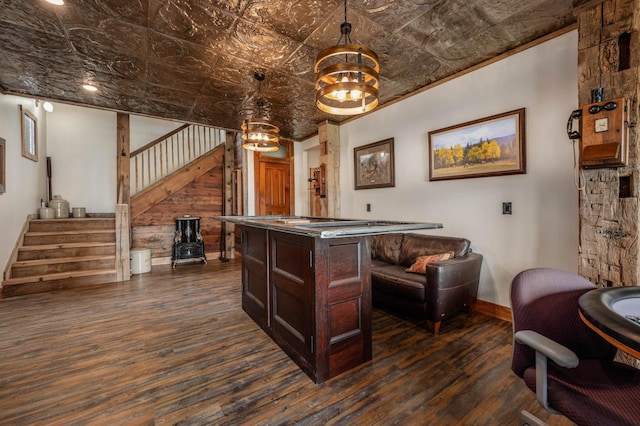 interior space featuring an ornate ceiling, stairway, dark wood finished floors, and decorative light fixtures