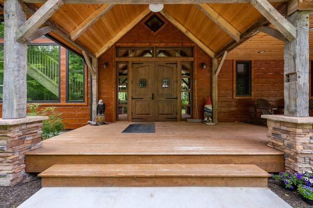 doorway to property with covered porch