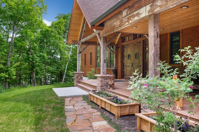 exterior space with a porch and a vegetable garden