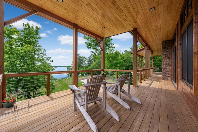 deck featuring a water view