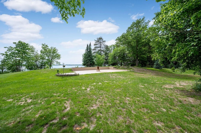 view of yard with a water view