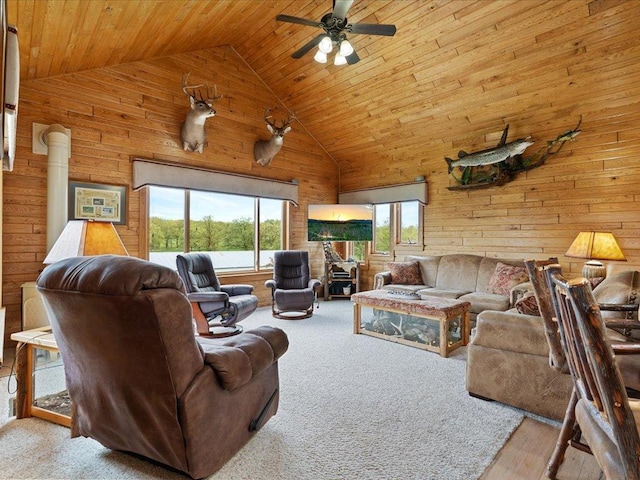 6167 24th St SW, Pine River, MN 56474 - living room featuring wooden walls, wood ceiling, ceiling fan, high vaulted ceiling, and wood finished floors