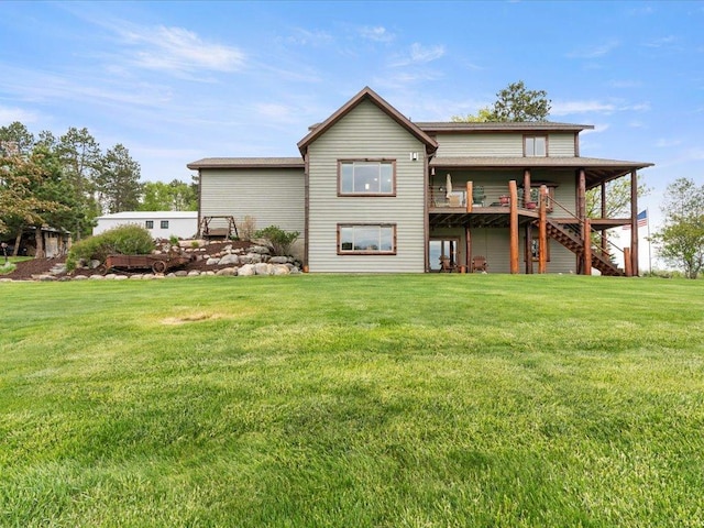6167 24th St SW, Pine River, MN 56474 - rear view of house with a yard, stairway, and a wooden deck