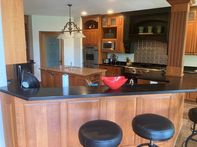 kitchen with stainless steel appliances, a kitchen island with sink, a sink, and open shelves