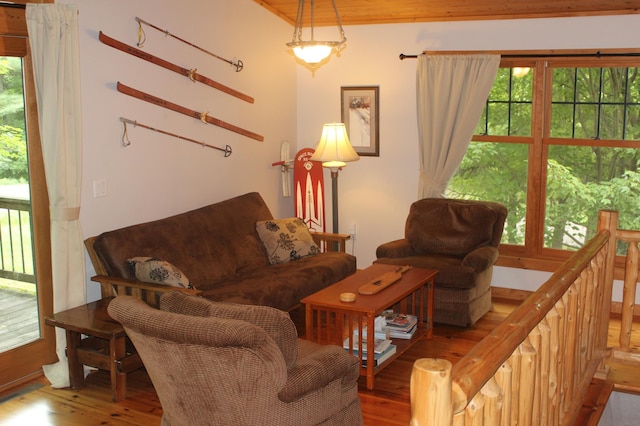 living area featuring plenty of natural light and wood finished floors