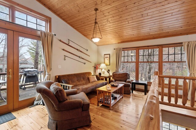 7251 County Rd B, Siren Twp, WI 54872 - living room featuring wooden ceiling, vaulted ceiling, french doors, and light wood-style floors