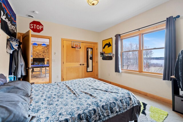 7251 County Rd B, Siren Twp, WI 54872 - bedroom featuring baseboards, visible vents, and carpet floors
