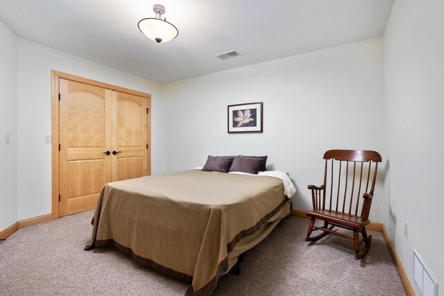 7251 County Rd B, Siren Twp, WI 54872 - bedroom with light colored carpet, baseboards, and visible vents