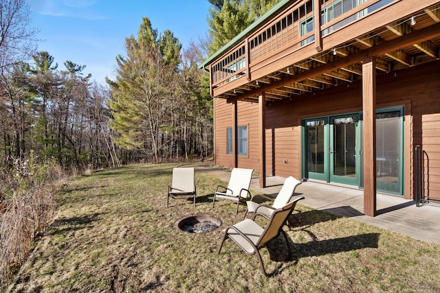 7251 County Rd B, Siren Twp, WI 54872 - view of yard with a wooden deck, french doors, a patio area, and a fire pit
