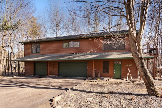 7251 County Rd B, Siren Twp, WI 54872 - view of front of property featuring an attached garage and aphalt driveway