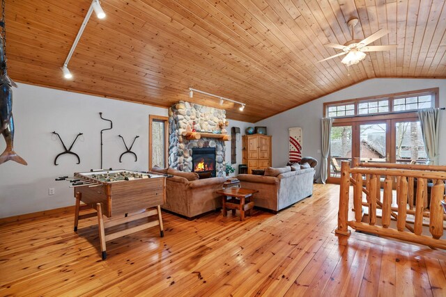 7251 County Rd B, Siren Twp, WI 54872 - living room featuring light wood finished floors, vaulted ceiling, ceiling fan, wooden ceiling, and rail lighting