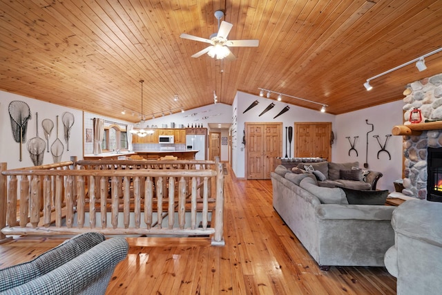 7251 County Rd B, Siren Twp, WI 54872 - living area with track lighting, light wood-type flooring, vaulted ceiling, ceiling fan, and wooden ceiling