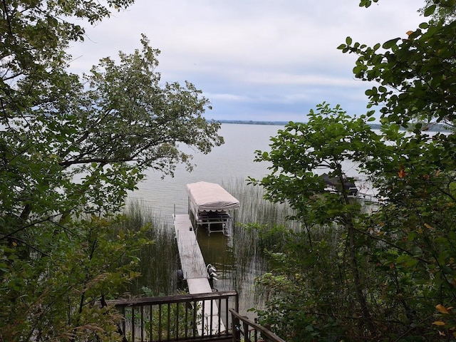 dock area featuring a water view