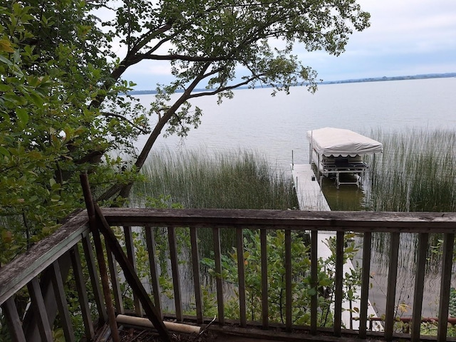 exterior space featuring a water view and boat lift