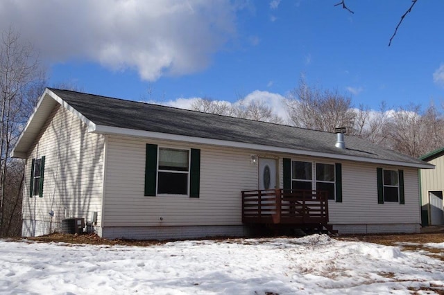 ranch-style house with central AC unit