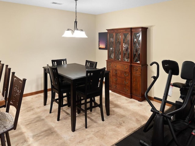 dining area with visible vents and baseboards