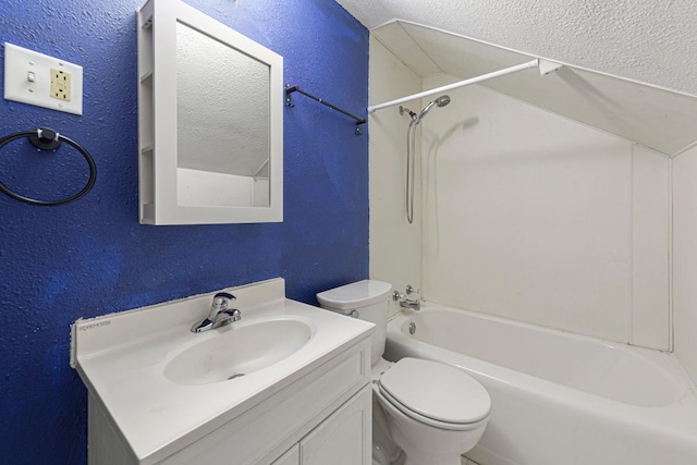 full bathroom with  shower combination, a textured wall, vanity, and toilet