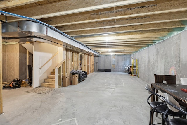 unfinished basement with stairs